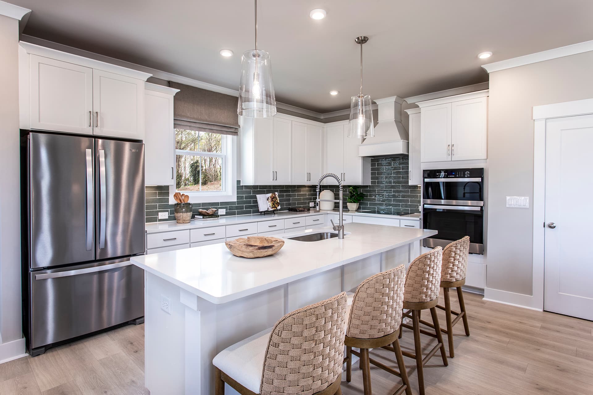 kitchen with white quartz counters and white cabinets