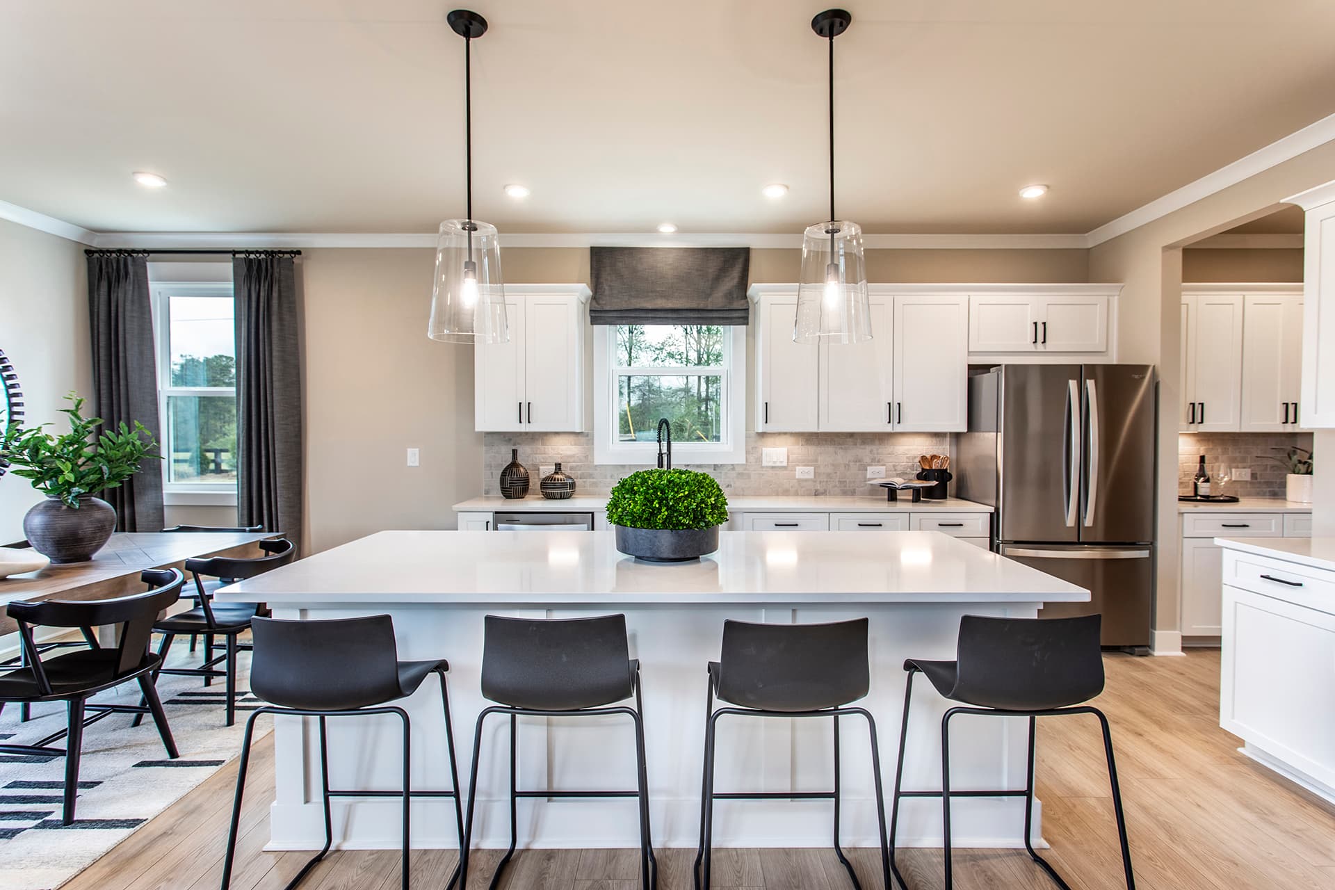 kitchen with white cabinets and white quartz counters