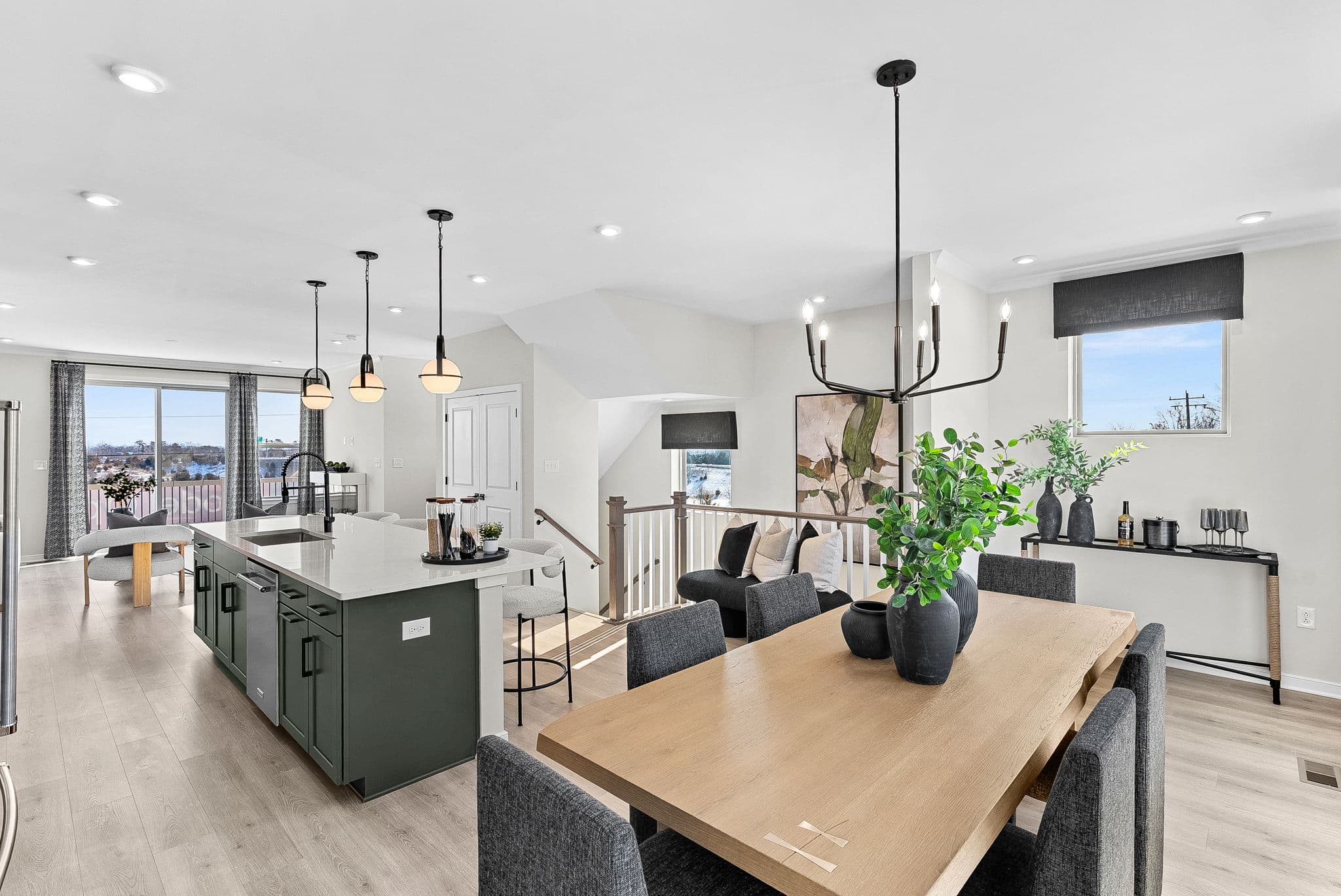 dining table with 6 chairs and view of kitchen