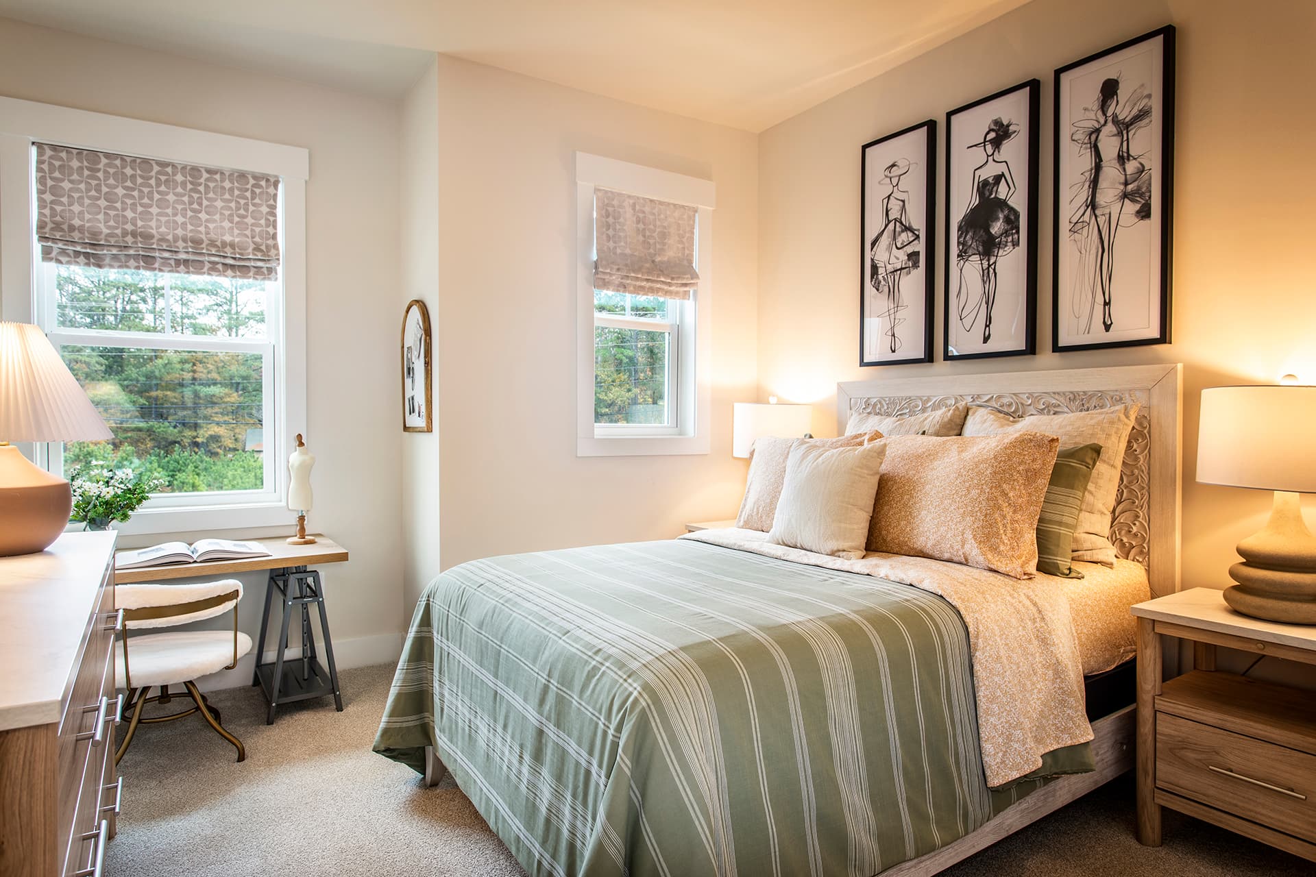 secondary bedroom with queen bed and windows