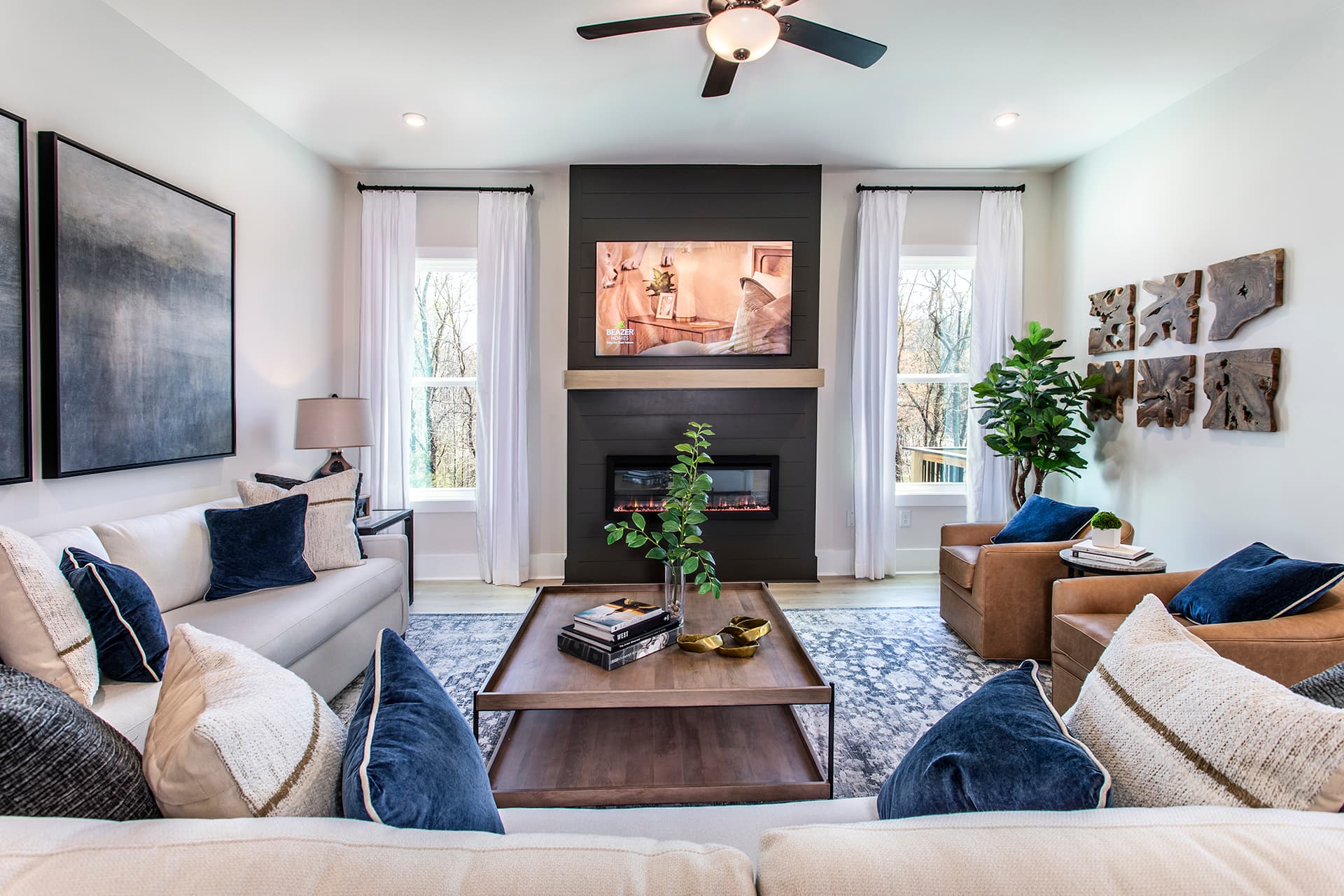 great room with electric fireplace and hard surface flooring