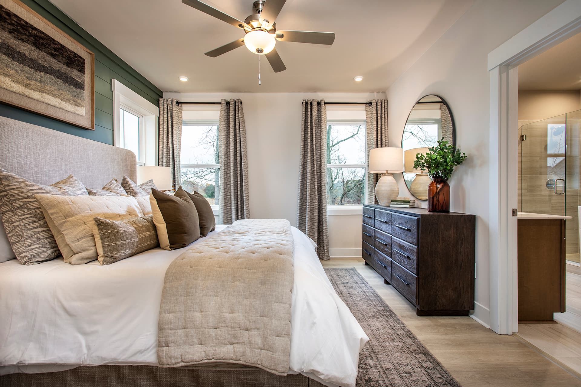 primary bedroom with king bed and ensuite bath